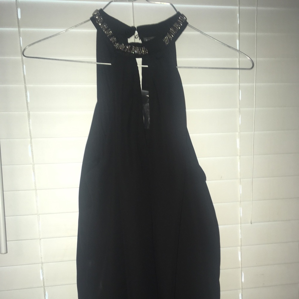 Nice black high neck top with rhinestone neck